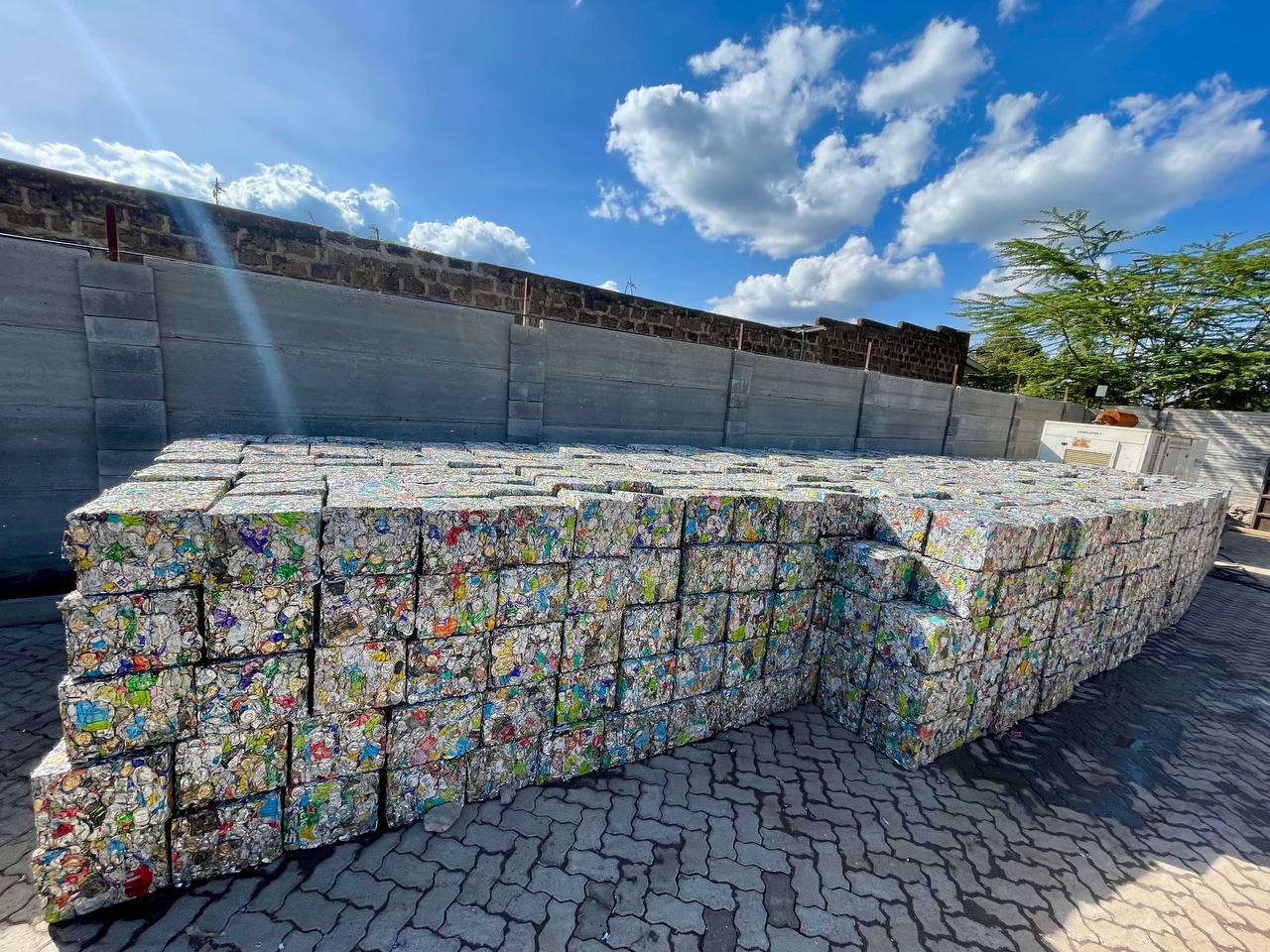 Baled UBC aluminium stacked in the NUEF Technology yard, Nairobi